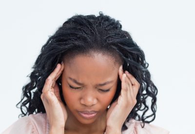 lady suffering from migraine