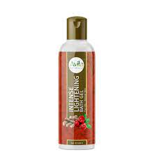 A bottle of body lotion with red berries and cranberries.