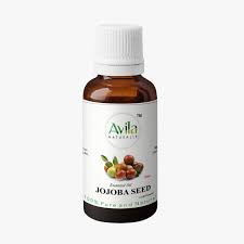 A bottle of jojoba seed oil on a white background.