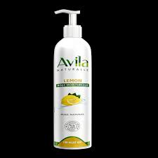 Avila body lotion with lemon on a black background.