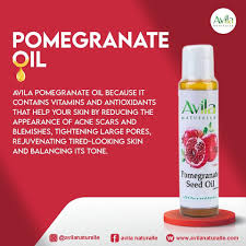 Advertisement for avila pomegranate oil, highlighting its skin benefits such as reducing acne scars and tightening pores, with an image of the product bottle on a red background.