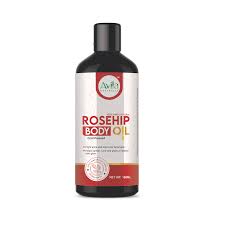 A bottle of avila rosehip body oil, featuring red and white label design, isolated on a white background.