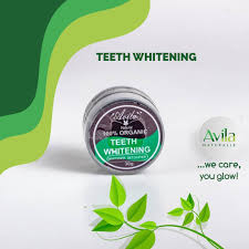 A jar of avila organic teeth whitening powder with a green and white background featuring leaves and the text "teeth whitening".