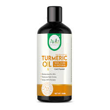 A bottle of avila turmeric oil labeled with benefits such as rejuvenating skin, reducing hair fall, and being naturally cold-pressed.