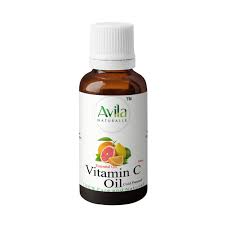 A small bottle of Avila Vitamin C Oil with a label depicting citrus fruits and the company's logo, isolated on a white background.