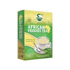 A box of African Veggies Tea with green and yellow packaging featuring a teacup and spoon on the front. The box includes text stating "Detoxing and Immune Booster" and "Net wt. 15 bags".