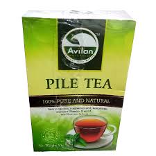 A box of Avilan Pile Tea with a green and yellow design. The text reads "100% Pure and Natural" and shows an image of a teacup with a tea bag beside it.