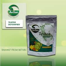 A package of Avilan Teatox Detoxifier against a green background, with the text "RADIANT FROM WITHIN" at the bottom. Another small image showcases the product logo and name.